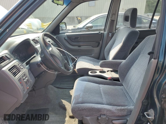 1998 Honda CR-V EX z VIN JHLRD1864WC107475, wystawiony jako Copart lot #59886595 z przebiegiem 211 972 mil mil oraz Szkoda całkowita • Salvage title. Historia ofert i sprzedaży dostępna na DreamBid. Obrazek 7.