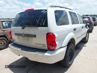 2009 Dodge Durango SLT with VIN 1D8HD48P19F701870, listed as a IAAI auction lot 42486939 with 214,786 mi miles and . Bid and sale history available at DreamBid. Image 4.