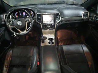 2015 Jeep Grand Cherokee Overland with VIN 1C4RJFCT2FC613502, listed as a Copart auction lot 89207005 with 124,482 mi miles and Salvage Title. Bid and sale history available at carsss.com. Image 8.