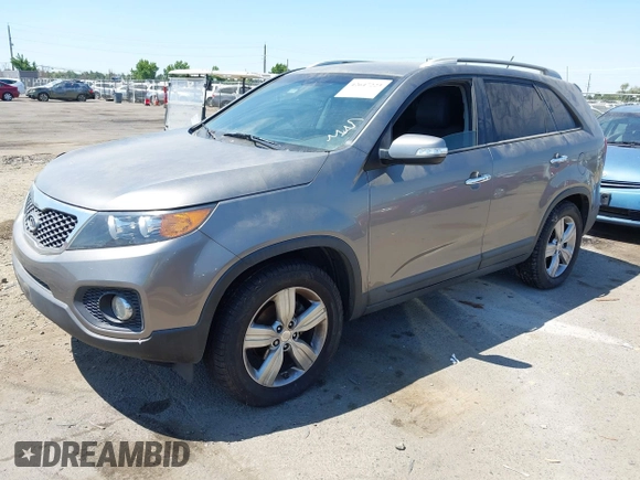 2012 Kia Sorento EX with VIN 5XYKU3A60CG305675, listed as a IAAI auction lot 42647223 with 174,447 mi miles and . Bid and sale history available at DreamBid. Image 2.