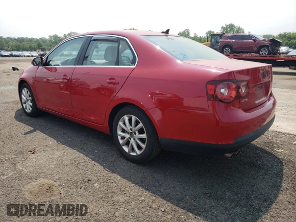 2010 Volkswagen Jetta SE with VIN 3VWRZ7AJ4AM059304, listed as a Copart auction lot 59497295 with 114,957 mi miles and Salvage title. Bid and sale history available at DreamBid. Image 2.