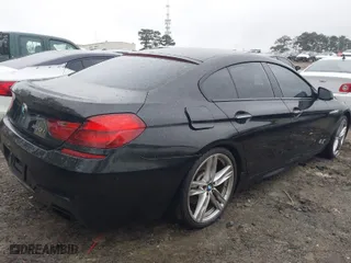 2014 BMW 6 Series 650i with VIN WBA6B2C55ED129162, listed as a IAAI auction lot 41917771 with 100,452 mi miles. Bid and sale history available at carsss.com. Image 4.