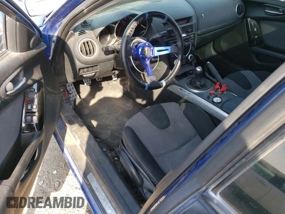 2004 Mazda RX-8 with VIN JM1FE173440114865, listed as a Copart auction lot 75385304 with 67,943 mi miles and Clean Title. Bid and sale history available at DreamBid. Image 8.