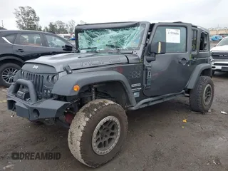 2018 Jeep Wrangler JK Unlimited Sport with VIN 1C4BJWDG3JL828513, listed as a IAAI auction lot 41535694 with 160,254 mi miles. Bid and sale history available at carsss.com. Image 2.