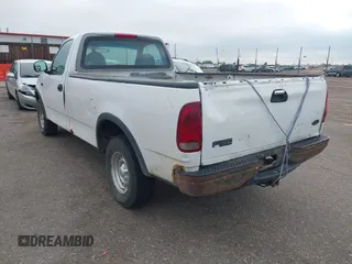1998 Ford F-150 with VIN 1FTZF1820WKA25768, listed as a IAAI auction lot 42574710 with 206,902 mi miles and . Bid and sale history available at DreamBid. Image 3.