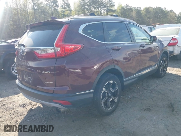 2018 Honda CR-V Touring with VIN 7FARW2H9XJE064414, listed as a IAAI auction lot 41904372 with 88,219 mi miles and . Bid and sale history available at DreamBid. Image 4.