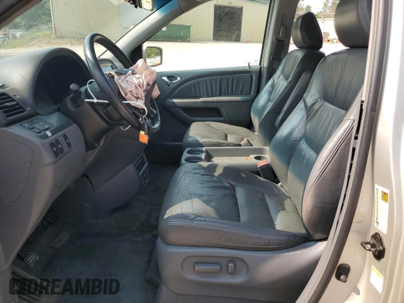 2006 Honda Odyssey EX-L with VIN 5FNRL38706B037805, listed as a Copart auction lot 57390365 with 219,554 mi miles and Salvage title. Bid and sale history available at DreamBid. Image 7.
