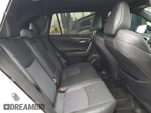 2024 Toyota RAV4 Hybrid XSE with VIN 4T3E6RFV0RU141591, listed as a Copart auction lot 59623085 with 27,682 mi miles and Salvage title. Bid and sale history available at DreamBid. Image 11.