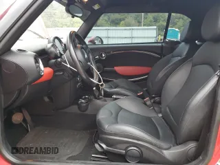 2011 MINI Convertible with VIN WMWZN3C51BTZ78331, listed as a Copart auction lot 73348304 with 94,219 mi miles and Salvage title. Bid and sale history available at DreamBid. Image 7.