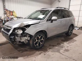 2016 Subaru Forester 2.0XT Premium with VIN JF2SJGDC4GH551225, listed as a IAAI auction lot 40831025 with 70,996 mi miles. Bid and sale history available at carsss.com. Image 2.