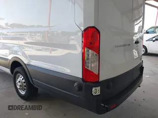 2022 Ford Transit Cargo with VIN 1FTBW3X89NKA69141, listed as a IAAI auction lot 41980864 with 102,721 mi miles and . Bid and sale history available at DreamBid. Image 21.