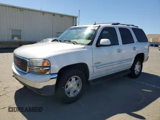 2004 GMC Yukon SLE with VIN 1GKEK13T54J168734, listed as a Copart auction lot 71235204 with 174,429 mi miles and Salvage Title. Bid and sale history available at carsss.com. Image 1.