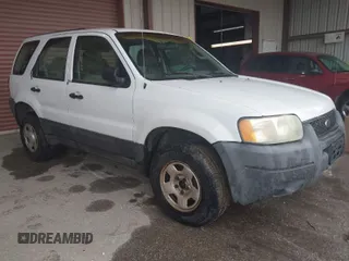 2004 Ford Escape XLS with VIN 1FMYU02134DA08567, listed as a IAAI auction lot 41872076 with 239,602 mi miles and . Bid and sale history available at DreamBid. Image 1.