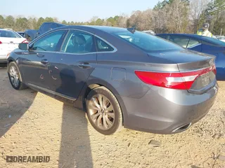 2013 Hyundai Azera with VIN KMHFG4JG6DA243655, listed as a IAAI auction lot 41802097 with 135,677 mi miles. Bid and sale history available at carsss.com. Image 3.