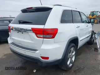 2013 Jeep Grand Cherokee Overland with VIN 1C4RJECG5DC648593, listed as a IAAI auction lot 41576630 with 187,098 mi miles. Bid and sale history available at carsss.com. Image 4.
