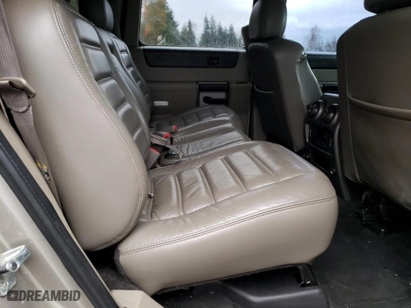 2003 Hummer H2 with VIN 5GRGN23U73H111109, listed as a Copart auction lot 76388144 with 160,179 mi miles and Salvage Title. Bid and sale history available at carsss.com. Image 12.
