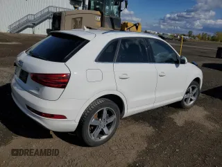 2015 Audi Q3 with VIN WA1EFEFS5FR009981, listed as a Copart auction lot 73714854 with 157,693 mi miles and Salvage title. Bid and sale history available at DreamBid. Image 3.