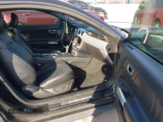 2017 Ford Mustang EcoBoost z VIN 1FA6P8TH1H5272339, wystawiony jako IAAI lot #41576468 z przebiegiem 125 455 mil mil oraz . Historia ofert i sprzedaży dostępna na DreamBid. Obrazek 5.