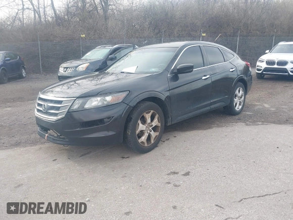 2010 Honda Crosstour EX-L z VIN 5J6TF2H51AL000543, wystawiony jako IAAI lot #41884879 z przebiegiem 194 277 mil mil oraz . Historia ofert i sprzedaży dostępna na DreamBid. Obrazek 2.