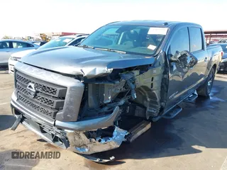 2021 Nissan Titan SV with VIN 1N6AA1EF2MN504611, listed as a IAAI auction lot 41469990 with 81,432 mi miles and . Bid and sale history available at DreamBid. Image 2.