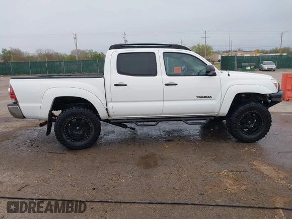 2014 Toyota Tacoma with VIN 3TMLU4EN8EM139665, listed as a IAAI auction lot 41925143 with 190,690 mi miles and . Bid and sale history available at DreamBid. Image 13.