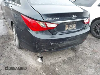 2013 Hyundai Sonata Limited with VIN 5NPEC4AB4DH804900, listed as a IAAI auction lot 41619907 with 152,278 mi miles and . Bid and sale history available at DreamBid. Image 6.