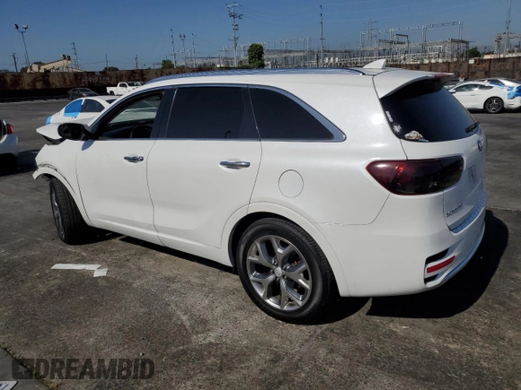2017 Kia Sorento SXL z VIN 5XYPK4A54HG250891, wystawiony jako Copart lot #57791565 z przebiegiem Nie podano mil oraz Szkoda całkowita • Salvage title. Historia ofert i sprzedaży dostępna na DreamBid. Obrazek 2.
