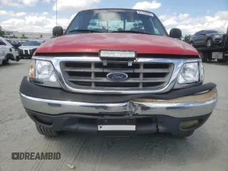 2000 Ford F-150 XL with VIN 1FTZF1824YNB06211, listed as a Copart auction lot 61137885 with 199,934 mi miles and Salvage title. Bid and sale history available at DreamBid. Image 5.