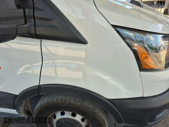 2020 Ford Transit Cargo z VIN 1FTYE1C89LKA17335, wystawiony jako IAAI lot #42561511 z przebiegiem 276 728 mil mil oraz . Historia ofert i sprzedaży dostępna na DreamBid. Obrazek 27.