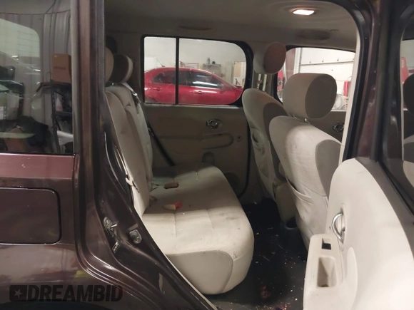 2009 Nissan Cube S z VIN JN8AZ28R39T124465, wystawiony jako IAAI lot #40769739 z przebiegiem 145 993 mil mil oraz . Historia ofert i sprzedaży dostępna na DreamBid. Obrazek 8.