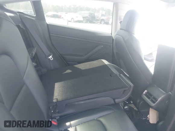 2022 Tesla Model 3 Long Range with VIN 5YJ3E1EB0NF106570, listed as a IAAI auction lot 41832622 with 52,679 mi miles and . Bid and sale history available at DreamBid. Image 8.