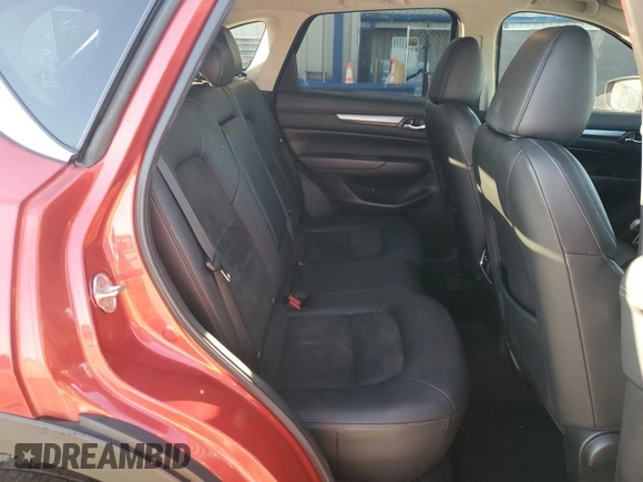 2021 Mazda CX-5 Touring with VIN JM3KFACM7M0393536, listed as a Copart auction lot 48488375 with 76,915 mi miles and Non Repairable. Bid and sale history available at DreamBid. Image 11.