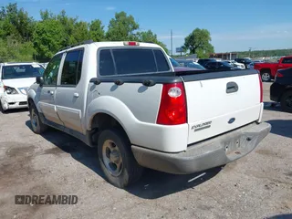 2005 Ford Explorer Sport Trac XLS z VIN 1FMZU67K25UB92409, wystawiony jako IAAI lot #42799036 z przebiegiem 150 554 mil mil oraz . Historia ofert i sprzedaży dostępna na DreamBid. Obrazek 3.