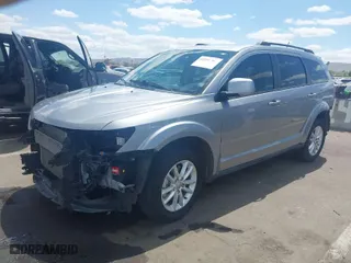 2017 Dodge Journey SXT with VIN 3C4PDCBG2HT547669, listed as a IAAI auction lot 42057787 with 83,363 mi miles. Bid and sale history available at carsss.com. Image 2.