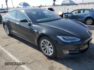 2018 Tesla Model S 75D с VIN 5YJSA1E29JF291834, выставлен на аукционе Copart как лот 55353725 с пробегом 26 871 миль миль и Списание • Salvage title. История ставок и продаж доступна на DreamBid. Изображение 4.