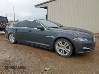 2016 Jaguar XJ Portfolio with VIN SAJWA2G74G8V98077, listed as a Copart auction lot 60354105 with 84,995 mi miles and Clean title. Bid and sale history available at DreamBid. Image 4.