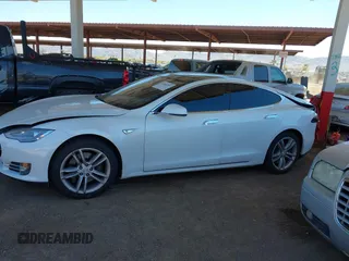 2013 Tesla Model S с VIN 5YJSA1CG8DFP22036, выставлен на аукционе IAAI как лот 41886249 с пробегом 125 477 миль миль и . История ставок и продаж доступна на DreamBid. Изображение 13.