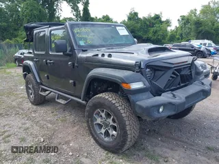 2020 Jeep Wrangler Unlimited Sport S with VIN 1C4HJXDN7LW113735, listed as a IAAI auction lot 42639884 with 48,736 mi miles and . Bid and sale history available at DreamBid. Image 1.