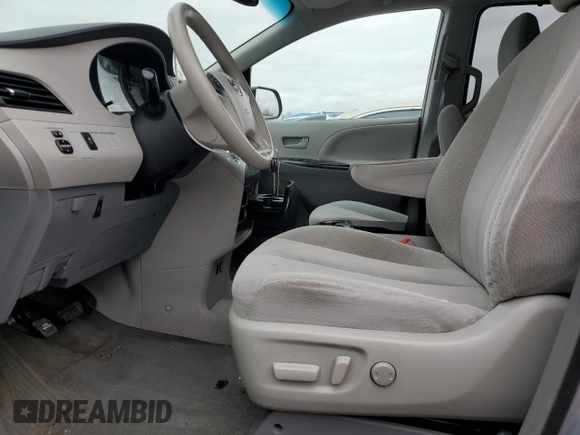 2014 Toyota Sienna LE AAS with VIN 5TDKK3DC0ES469196, listed as a Copart auction lot 50546685 with 179,160 mi miles and Salvage Title. Bid and sale history available at DreamBid. Image 7.