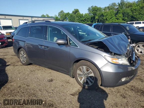 2014 Honda Odyssey Touring with VIN 5FNRL5H94EB116891, listed as a Copart auction lot 61400725 with 202,972 mi miles and Salvage title. Bid and sale history available at DreamBid. Image 4.