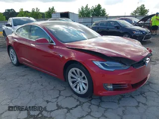 2017 Tesla Model S 60 z VIN 5YJSA1E14HF199130, wystawiony jako IAAI lot #42544333 z przebiegiem 72 858 mil mil oraz . Historia ofert i sprzedaży dostępna na DreamBid. Obrazek 1.