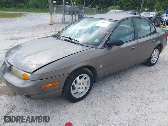 2000 Saturn SL z VIN 1G8ZK527XYZ121984, wystawiony jako IAAI lot #42099839 z przebiegiem 174 210 mil mil oraz . Historia ofert i sprzedaży dostępna na DreamBid. Obrazek 17.