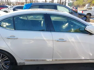 2015 Kia Cadenza Premium with VIN KNALN4D78F5180348, listed as a IAAI auction lot 41307129 with 61,924 mi miles. Bid and sale history available at carsss.com. Image 13.