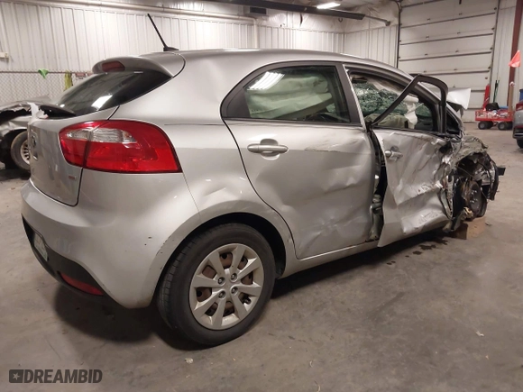 2013 Kia Rio LX with VIN KNADM5A31D6274318, listed as a IAAI auction lot 40986091 with 182,000 mi miles. Bid and sale history available at carsss.com. Image 4.