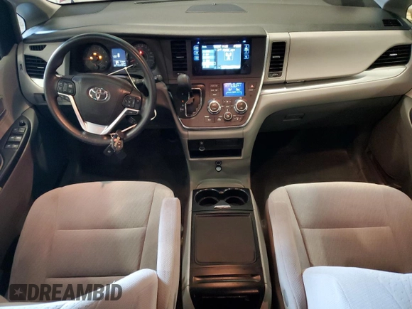 2015 Toyota Sienna LE AAS с VIN 5TDKK3DC2FS677288, выставлен на аукционе Copart как лот 57882845 с пробегом 162 458 миль миль и Списание • Salvage title. История ставок и продаж доступна на DreamBid. Изображение 8.