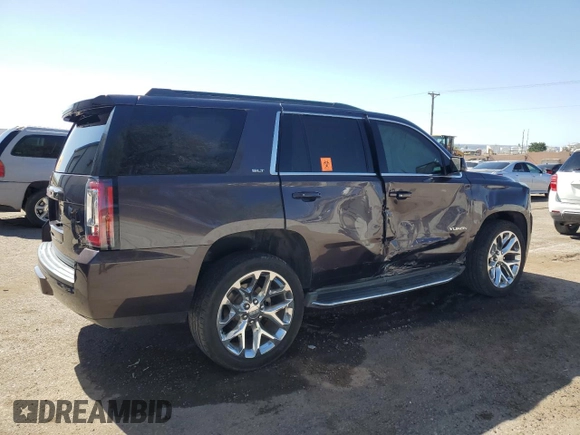 2015 GMC Yukon SLT z VIN 1GKS1BKC5FR689549, wystawiony jako Copart lot #56747385 z przebiegiem 102 856 mil mil oraz Szkoda całkowita • Salvage title. Historia ofert i sprzedaży dostępna na DreamBid. Obrazek 3.