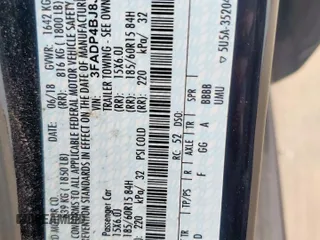 2018 Ford Fiesta SE z VIN 3FADP4BJ8JM134544, wystawiony jako Copart lot #58231305 z przebiegiem Nie podano mil oraz Tytuł czysty. Historia ofert i sprzedaży dostępna na DreamBid. Obrazek 12.