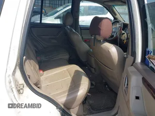 2002 Jeep Grand Cherokee Limited z VIN 1J4GX58N62C195783, wystawiony jako IAAI lot #42745397 z przebiegiem 242 502 mil mil oraz . Historia ofert i sprzedaży dostępna na DreamBid. Obrazek 8.