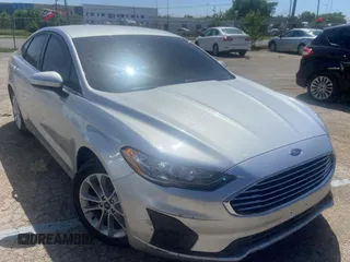 2019 Ford Fusion Hybrid SE with VIN 3FA6P0LU7KR241731, listed as a Copart auction lot 49031303 with 73,210 mi miles. Bid and sale history available at carsss.com. Image 1.
