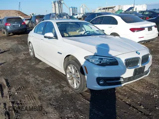 2016 BMW 5 Series 528i xDrive with VIN WBA5A7C52GG150287, listed as a IAAI auction lot 41684813 with 128,768 mi miles. Bid and sale history available at carsss.com. Image 1.